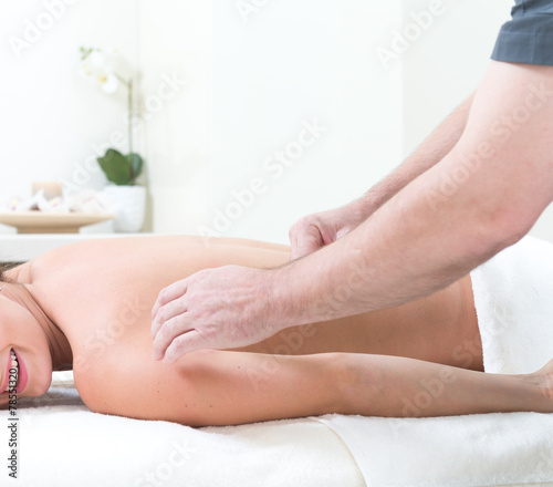 Massage on a woman at spa salon
