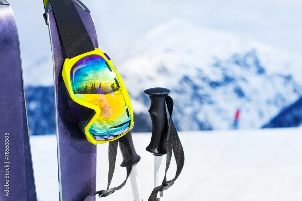 Naklejka premium Ski equipment with skies mask and polles
