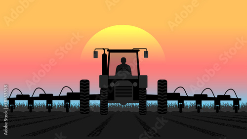 tractor processes the earth a rural landscape