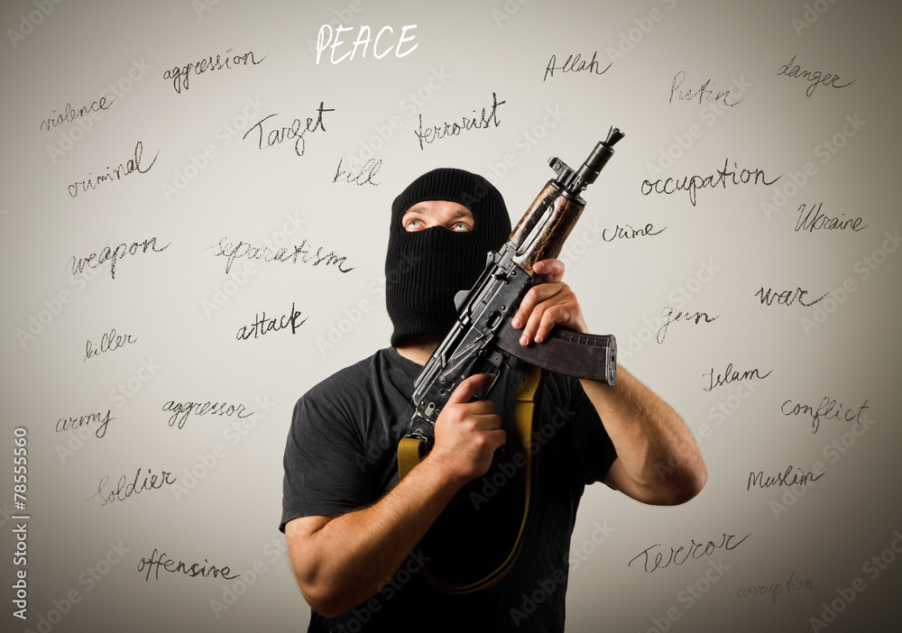 Fotografie Man with gun and peace.