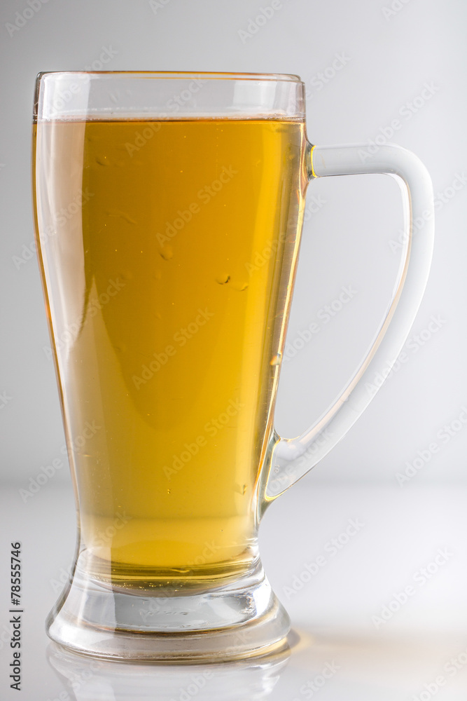 full glass of beer on white background full glass of beer on white background