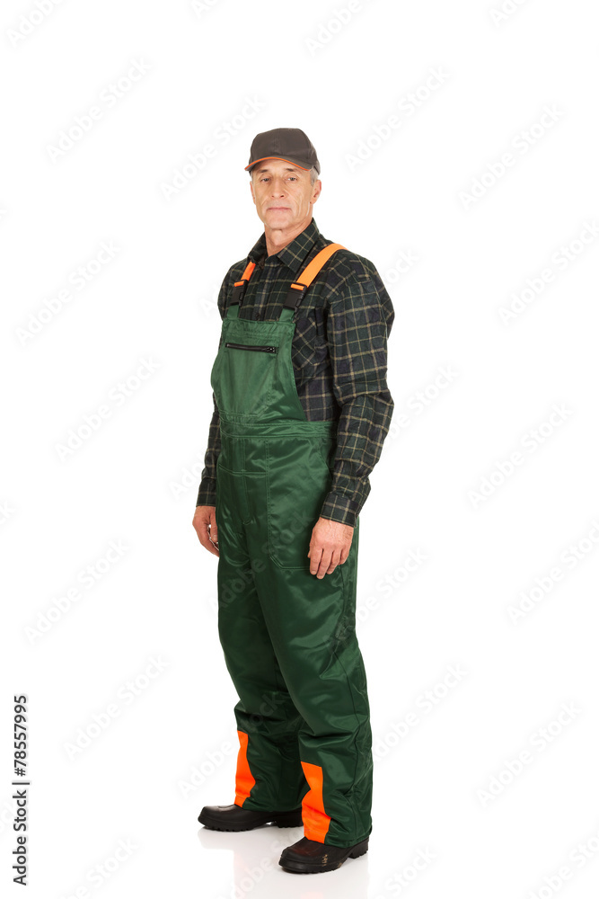 Fototapeta premium Mature gardener standing in uniform
