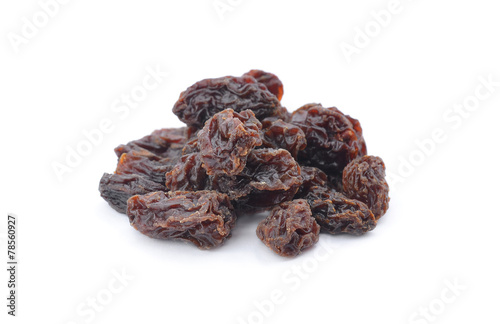 Dried raisins on a white background