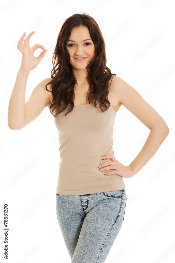 Young woman showing perfect sign. Young woman showing perfect sign.