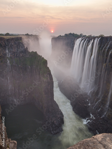 Victoria Falls sunset from Zambia side, rocks in the foreground