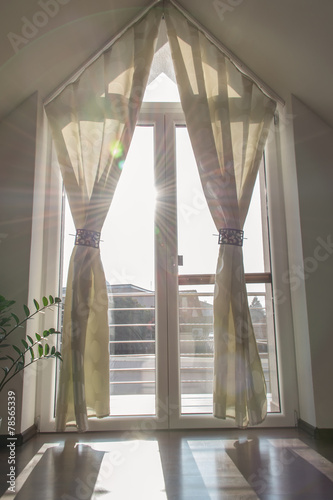 Obraz na płótnie Balcony window with curtains in the morning w salonie