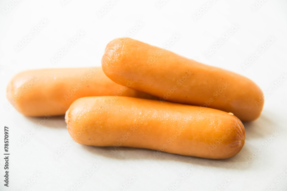 Appetizing fresh sausage on white background Appetizing fresh sausage on white background