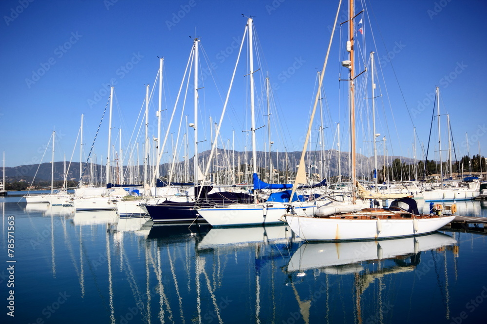 Stern to Mooring boats and yachts in marina