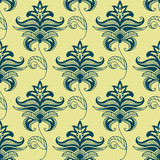 Green paisley floral pattern on yellow background