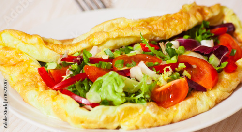 Omelet with vegetable salad