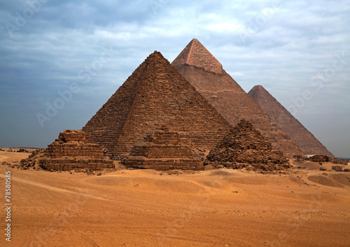 Fototapeta The Egyptian pyramids in the background of the desert.