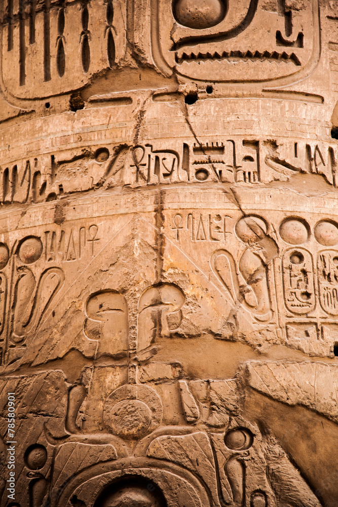 old egypt hieroglyphs carved on the stone
