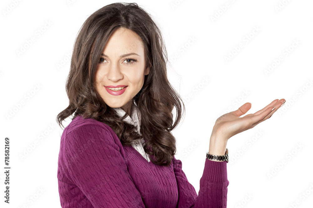 Beautiful young woman showing an imaginary object Beautiful young woman showing an imaginary object