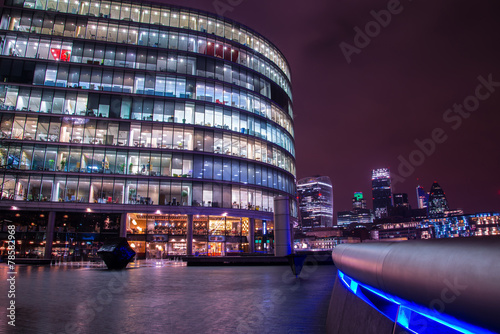 Photography London modern finance district in downtown iluminated at night.
