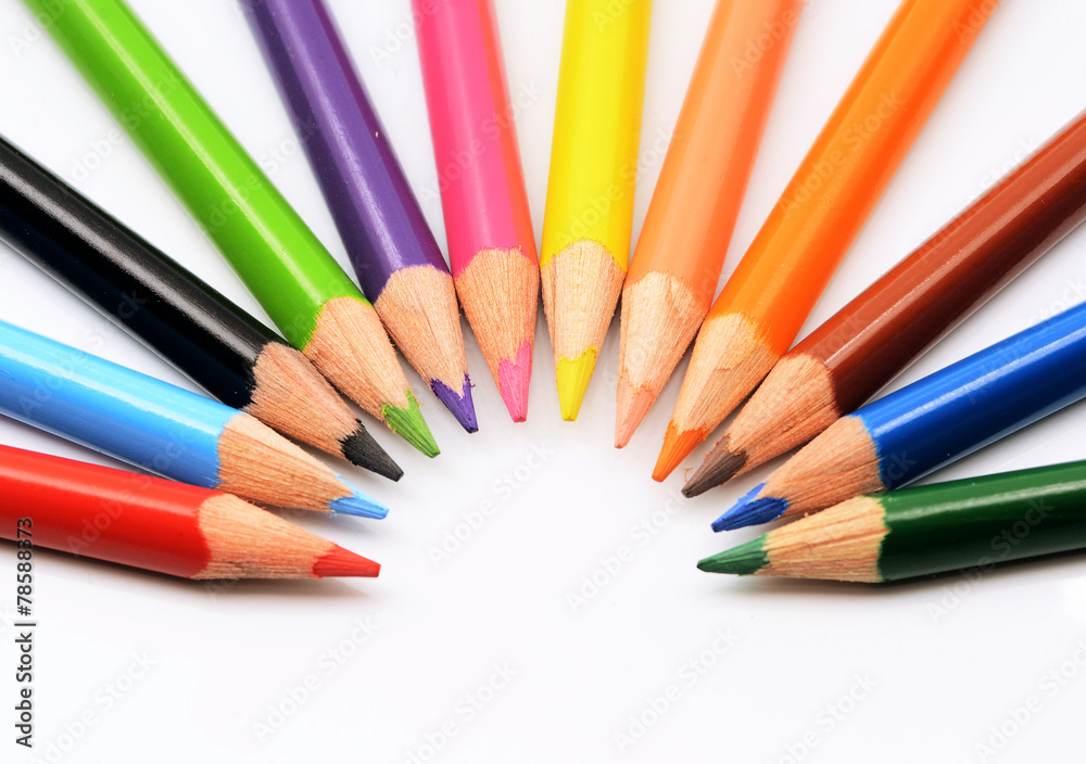 many different colored pencils with white background