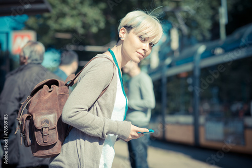 beautiful young blonde short hair hipster woman