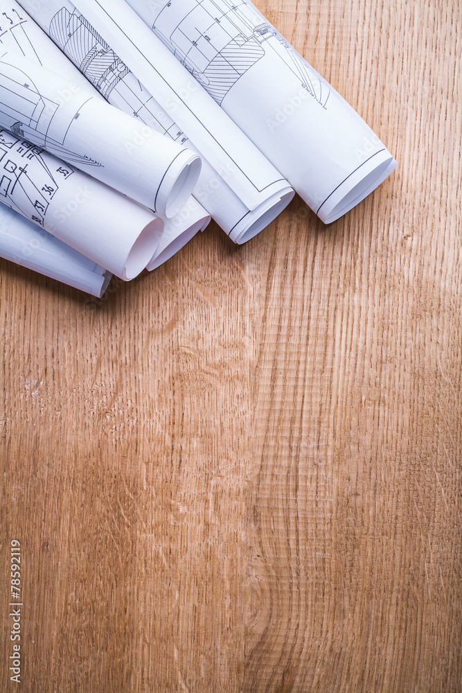 conceptual copyspace image white rolled up blueprints on vintage conceptual copyspace image white rolled up blueprints on vintage