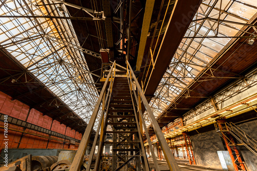 Ladder in industrial interior © annavaczi
