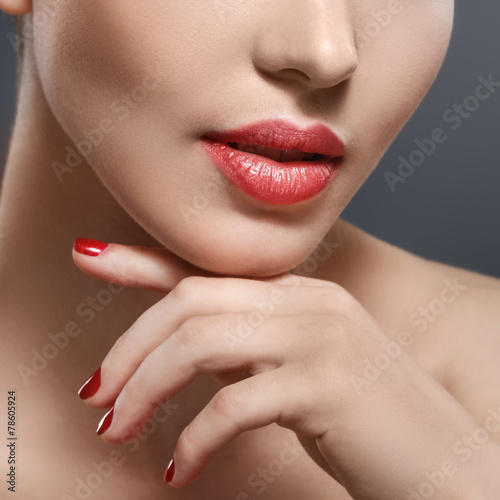 Part of woman face with red lips