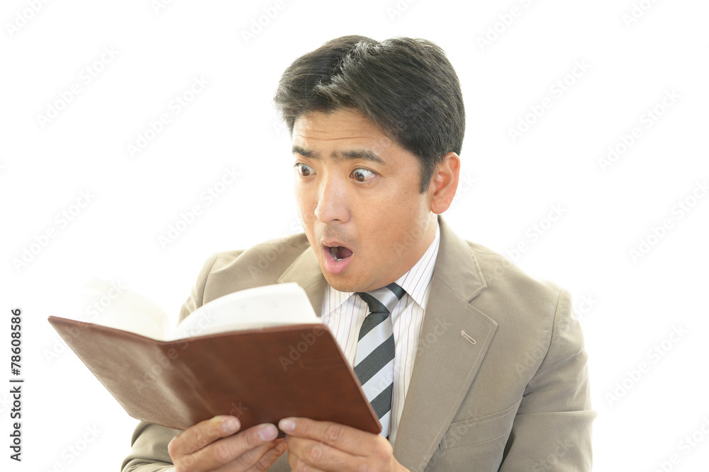 驚いた表情のビジネスマン 驚いた表情のビジネスマン