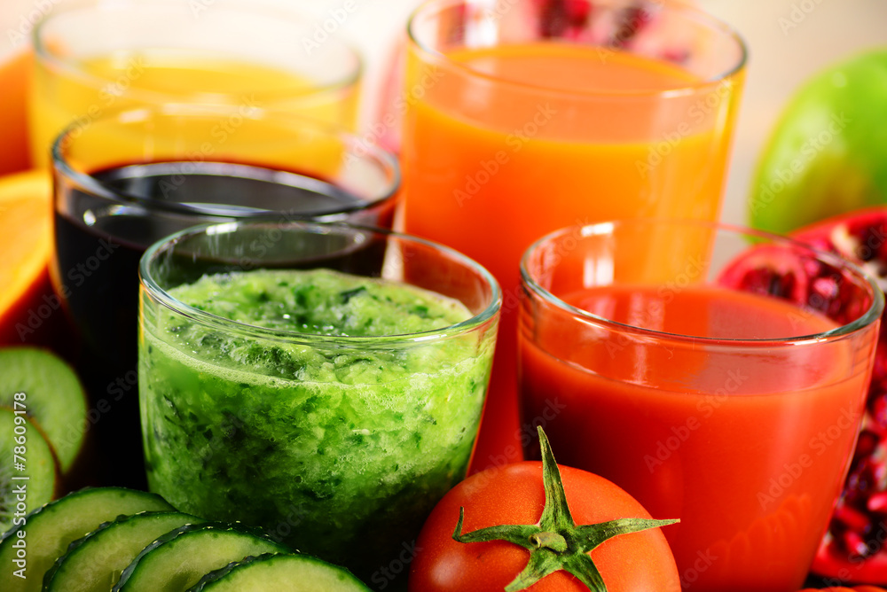 Glasses of fresh organic vegetable and fruit juices Glasses of fresh organic vegetable and fruit juices