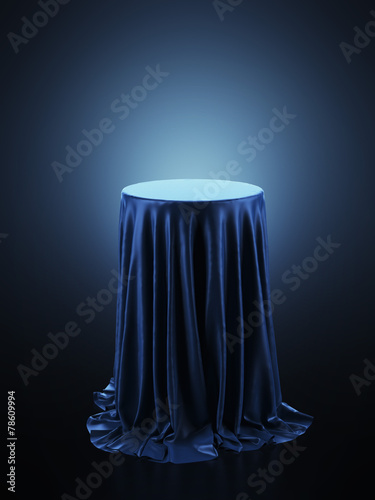 Table covered with blue cloth