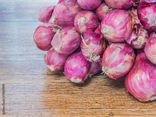 red onion on wood table