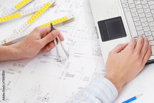 Male hands of a young architect working