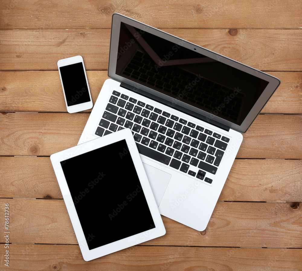 Open notebook, digital tablet and smart phone Open notebook, digital tablet and smart phone