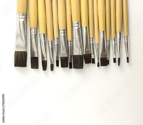 Paint brushes arrange  on white