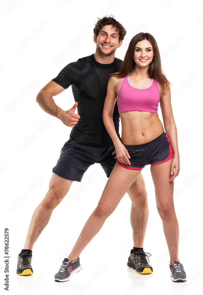 Athletic man and woman after fitness exercise with a finger up o Athletic man and woman after fitness exercise with a finger up o