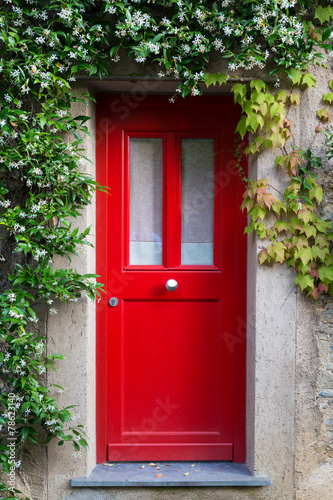 Red Entrance Door with jasmine flowers