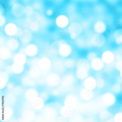Abstract Christmas background with bokeh lights and place for te