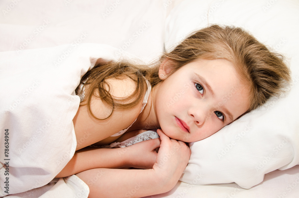 Sick little girl lying in the bed Sick little girl lying in the bed
