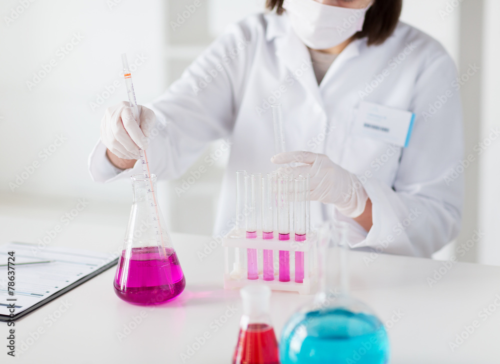 close up of scientist making test in lab close up of scientist making test in lab