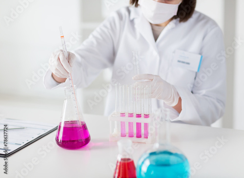 close up of scientist making test in lab