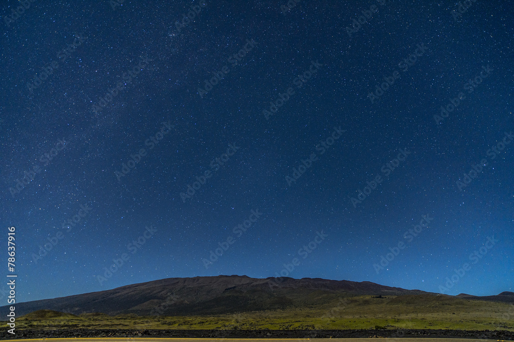 Starry sky from Daniel K Inouye highway of Hawaii, USA.
