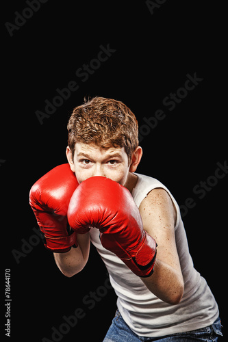 Boxer in a defensive stance © lighthousestock