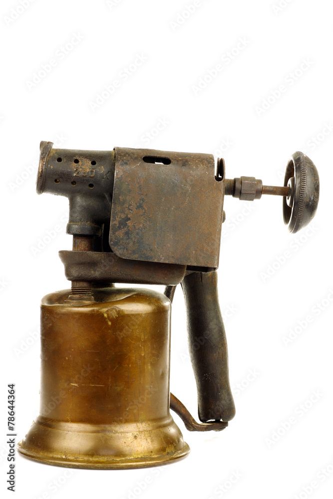 Old blowtorch on a white background