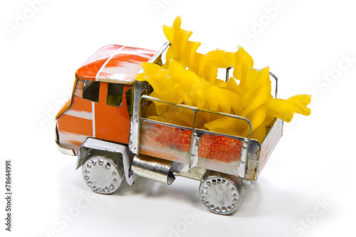 Small truck with a cargo of italian pasta - concept image photo