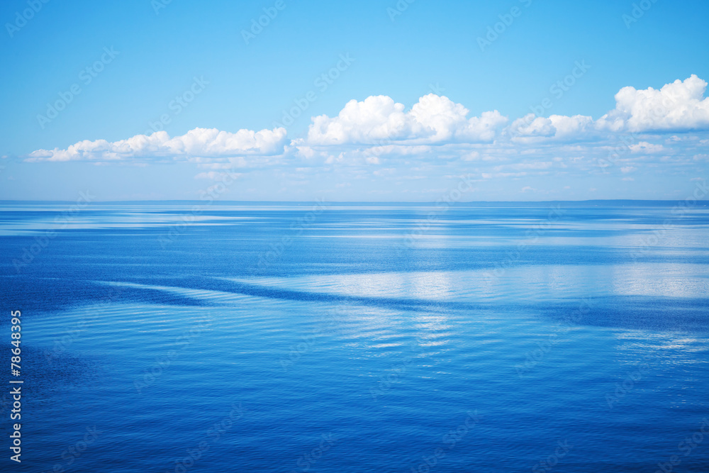 Seascape with blue water and blue sky