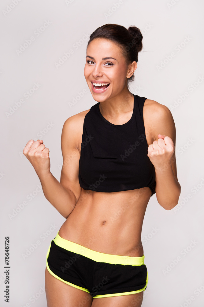Mixed race sporty woman gains victory Mixed race sporty woman gains victory