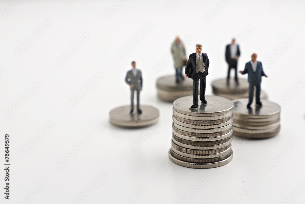 businessmans stand on the money coin white background businessmans stand on the money coin white background