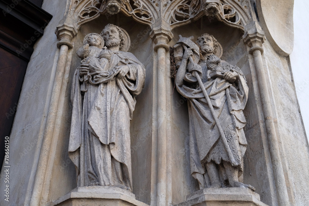St. Joseph holding baby Jesus and St. John the Baptist 