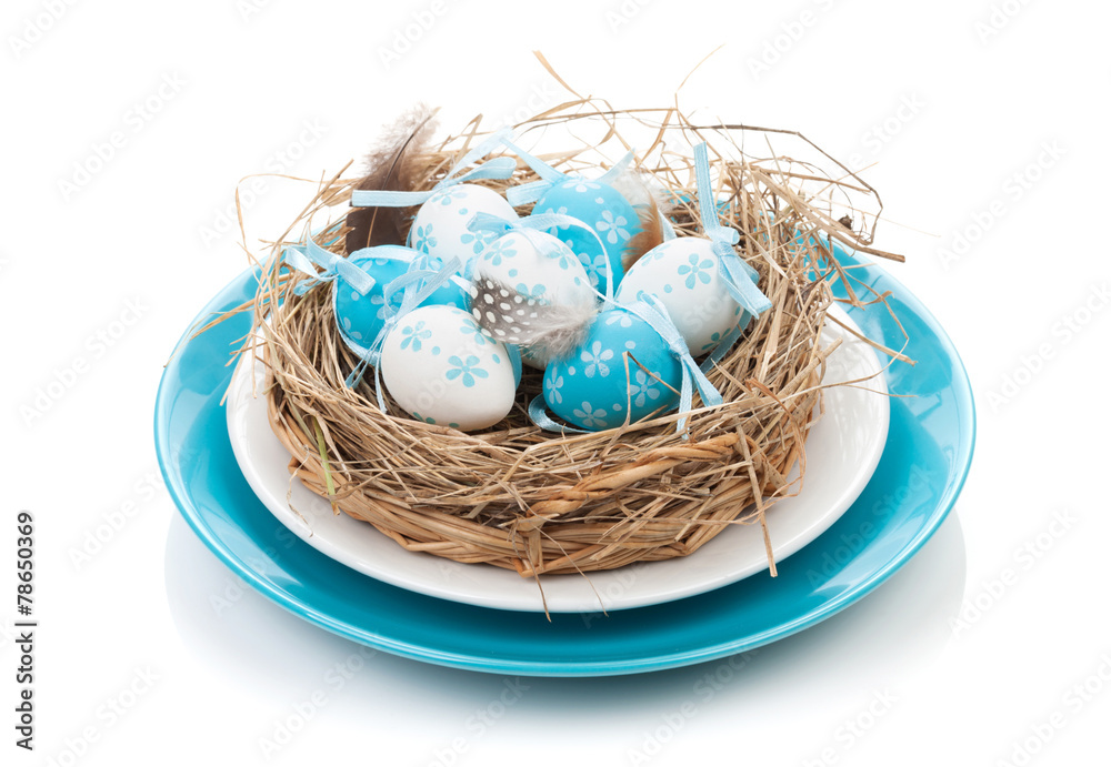 Obraz premium Easter eggs nest on plate