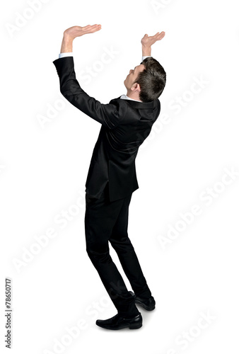 Business man lifting something