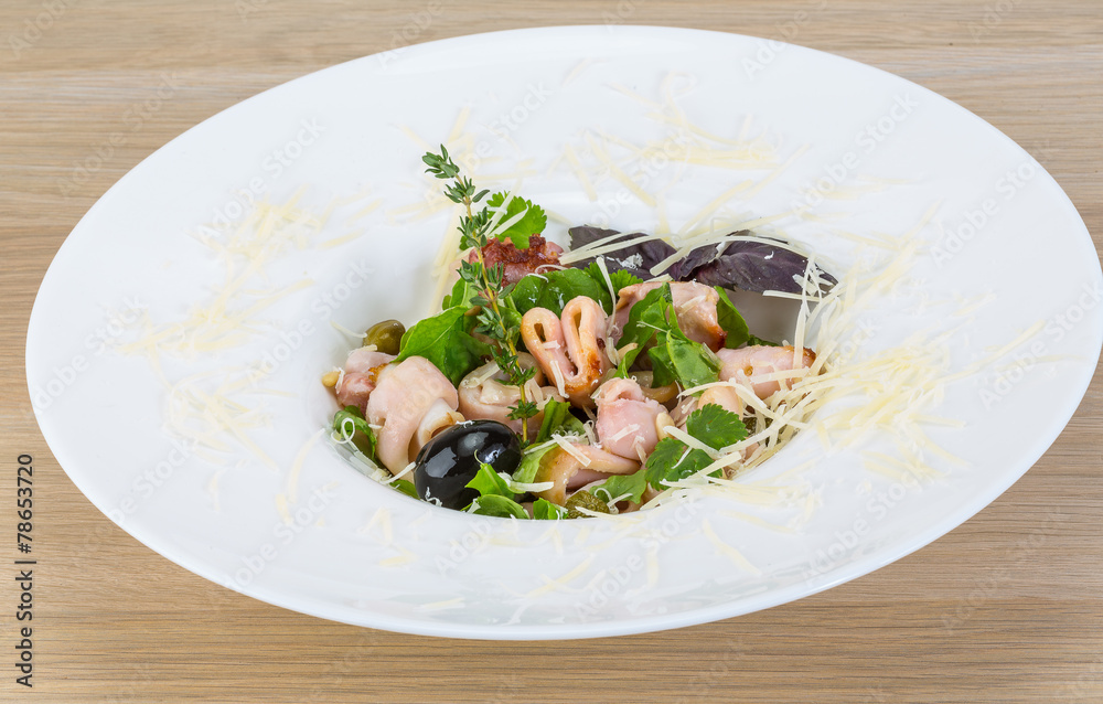 Rucola with squid salad