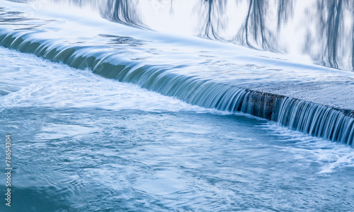 Obraz na plátně water texture river. Little waterfalls