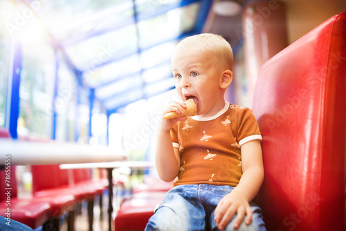 Little boy in cafe