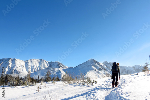 Climber on the snowy mountains © zenik